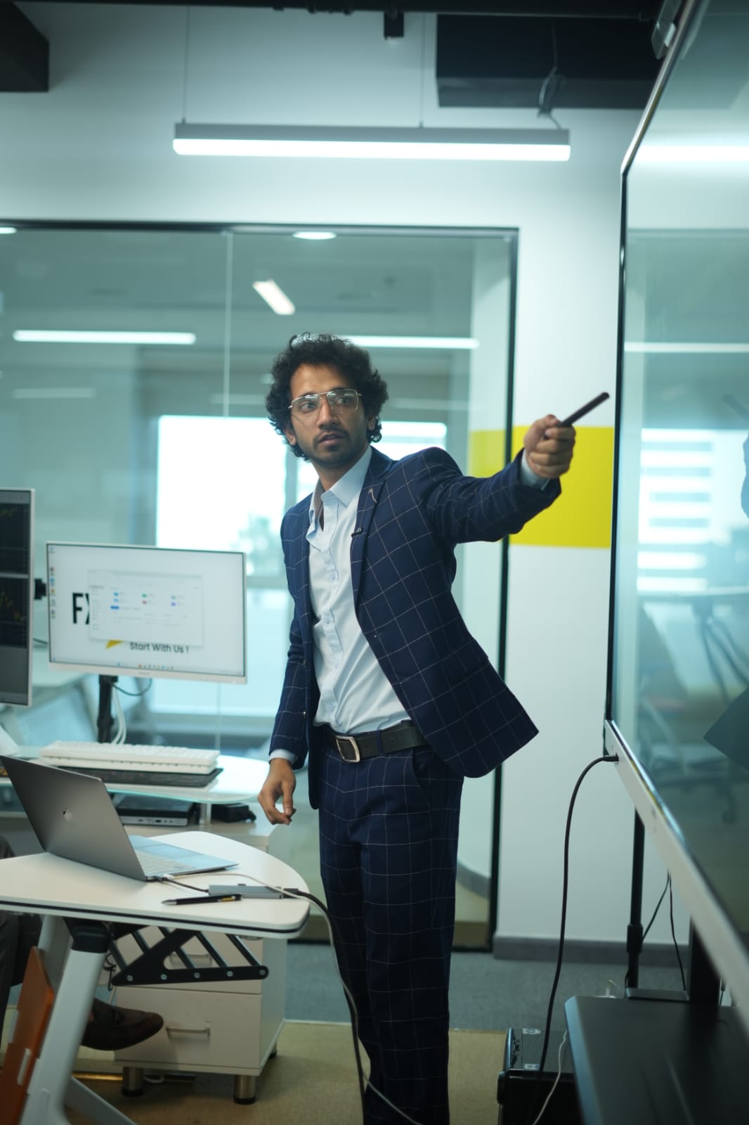 Anas Merchant explaining material during an academy training session